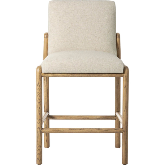 Taki Counter Stool by Four Hands in antwerp natural, lamont nettlewood, palermo cognac. Made from 39% flax/linen, 35% cotton, 26% polyester, solid nettlewood, top grain leather in a unique style.
