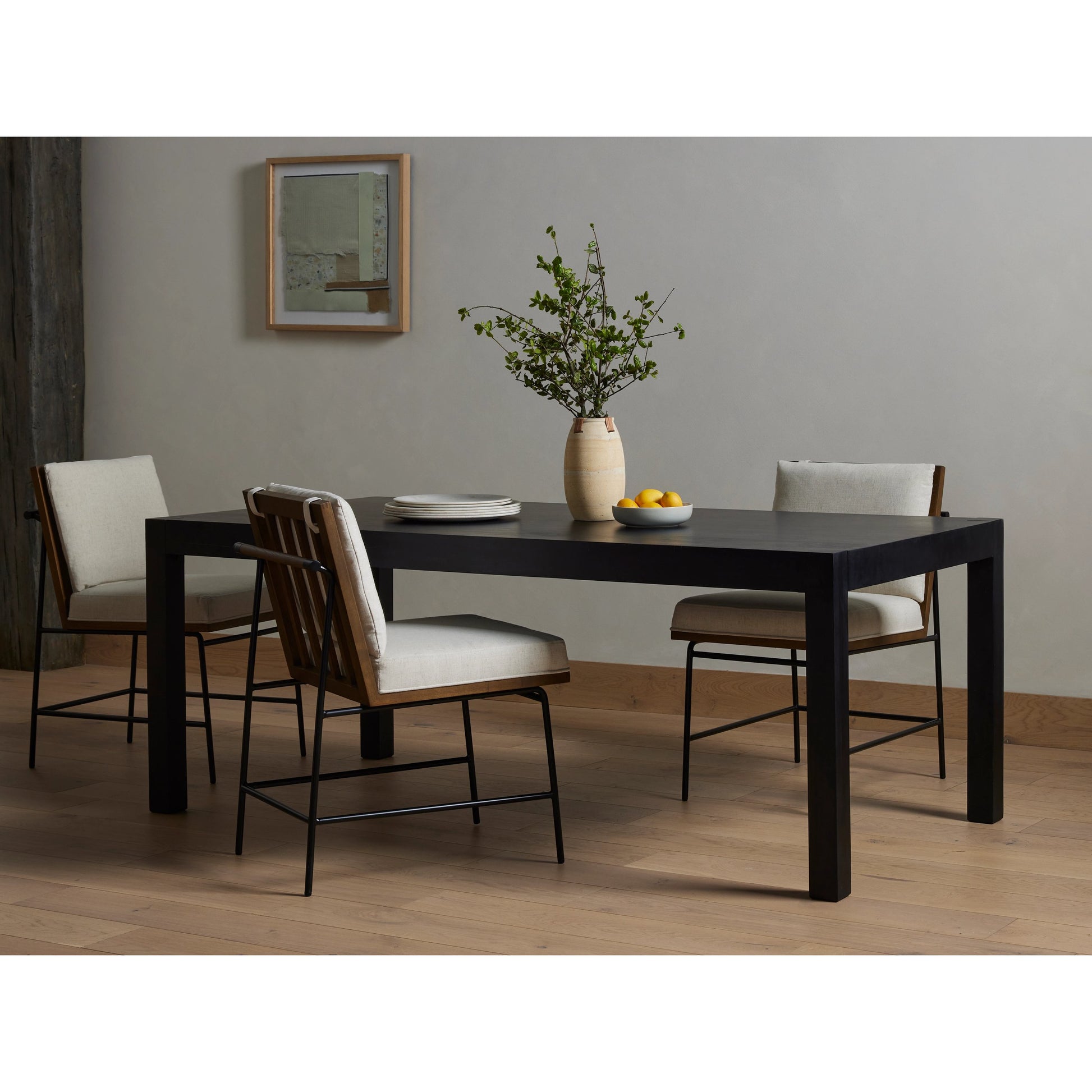 Isador Dining Table by Four Hands. Made from solid poplar in a modern style.