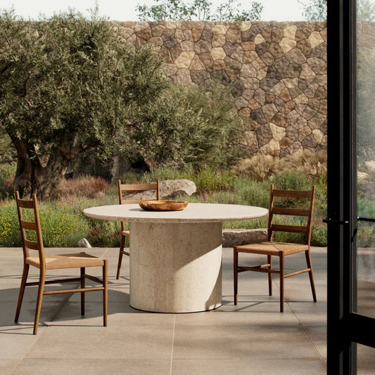 Oakland Outdoor Dining Table by Four Hands in outdoor cream marble. Made from solid marble in a transitional style.