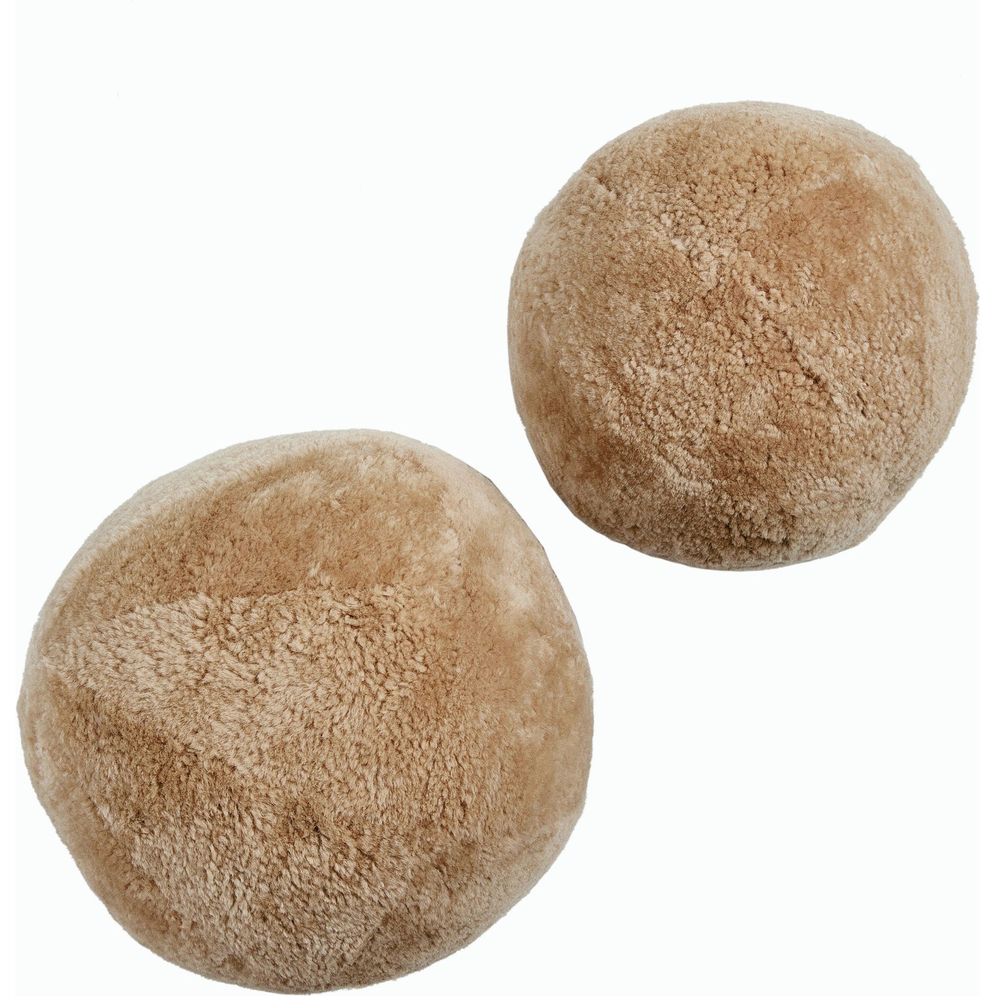 Balle Shearling Pillow Set by Four Hands in white shorn sheepskin. Made from 100% sheared sheepskin, down alternative fiber, 100% polyester in a transitional style.