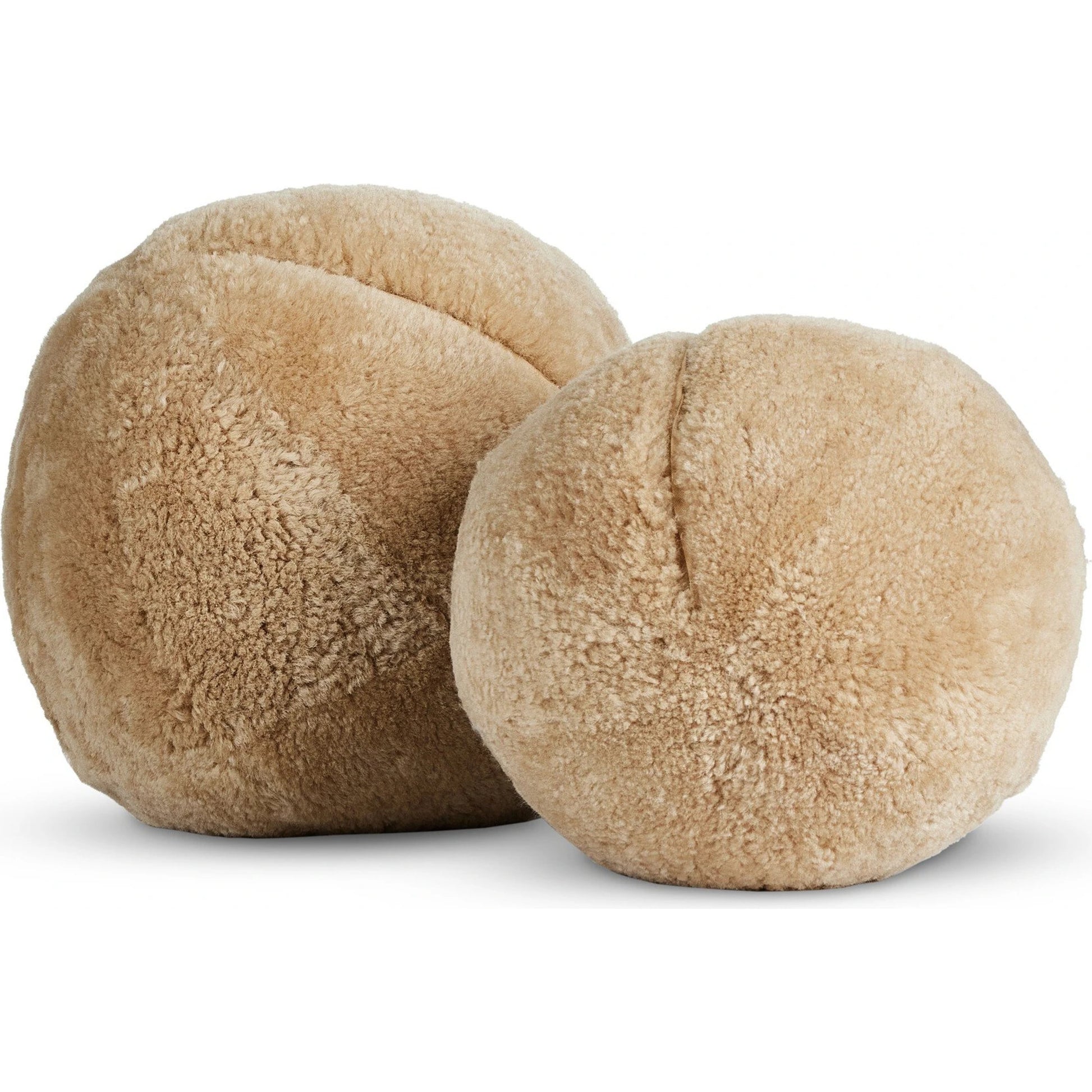 Balle Shearling Pillow Set by Four Hands in white shorn sheepskin. Made from 100% sheared sheepskin, down alternative fiber, 100% polyester in a transitional style.