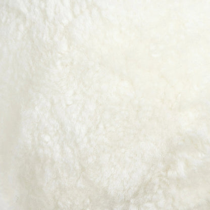 Balle Shearling Pillow Set by Four Hands in white shorn sheepskin. Made from 100% sheared sheepskin, down alternative fiber, 100% polyester in a transitional style.