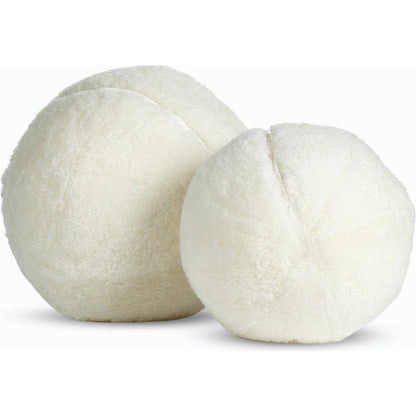 Balle Shearling Pillow Set by Four Hands in white shorn sheepskin. Made from 100% sheared sheepskin, down alternative fiber, 100% polyester in a transitional style.