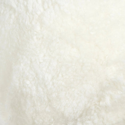 Balle Shearling Pillow Set by Four Hands in white shorn sheepskin. Made from 100% sheared sheepskin, down alternative fiber, 100% polyester in a transitional style.