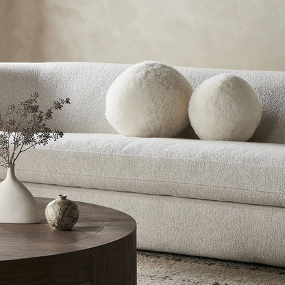 Balle Shearling Pillow Set by Four Hands in white shorn sheepskin. Made from 100% sheared sheepskin, down alternative fiber, 100% polyester in a transitional style.