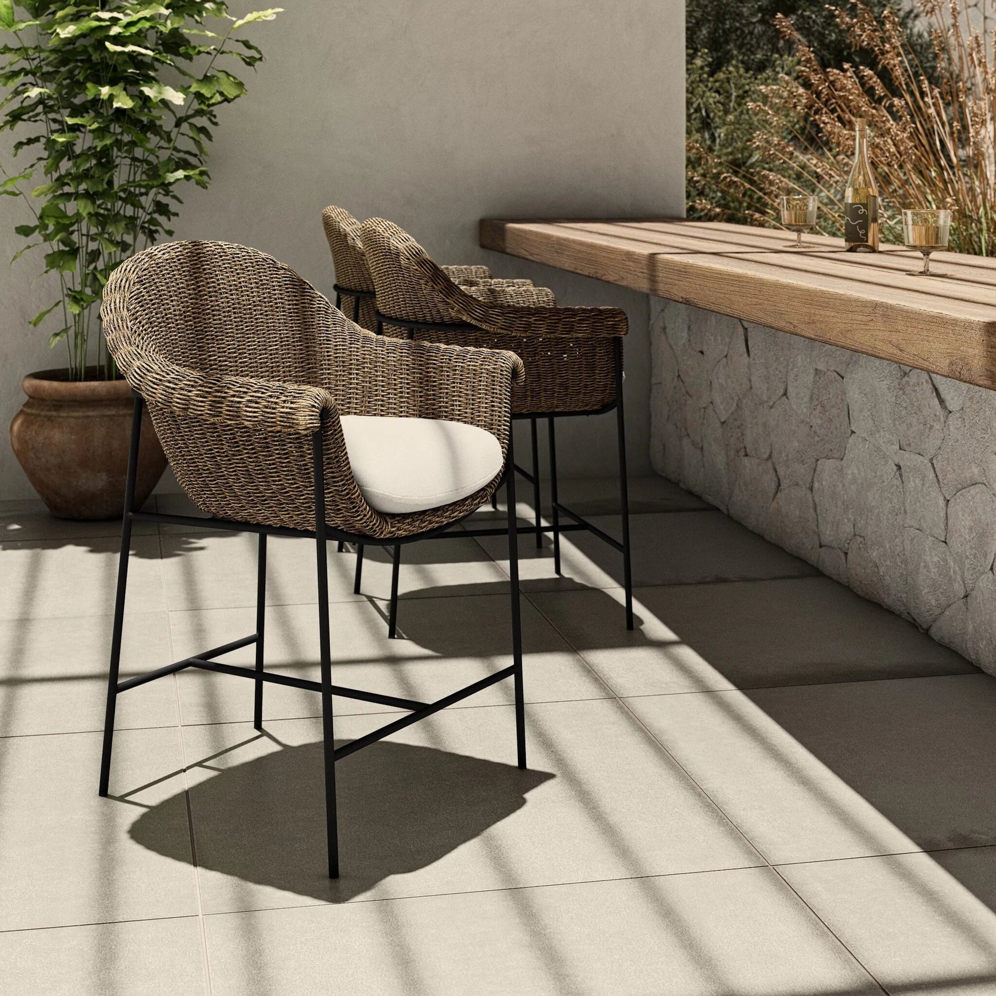 Suerte Outdoor Counter Stool by Four Hands. Made from 100% acrylic, iron, 100% polyethylene in a unique style.