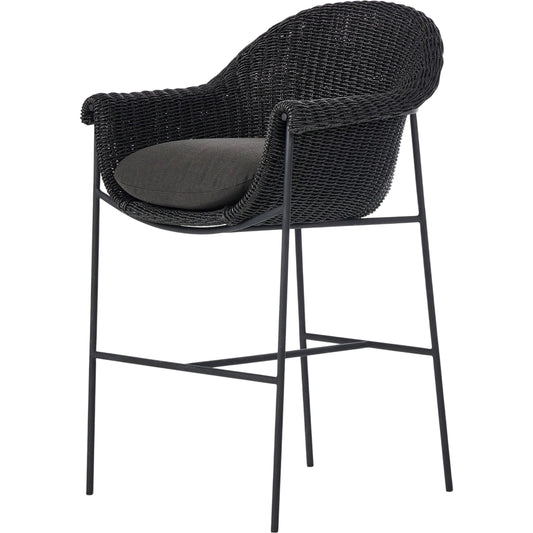 Suerte Outdoor Bar Stool by Four Hands. Made from 100% acrylic, iron, 100% polyethylene in a rustic style.