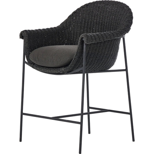 Suerte Outdoor Counter Stool by Four Hands in arashi ink, charcoal iron, faux black hyacinth. Made from 100% acrylic, iron, 100% polyethylene in a rustic style.