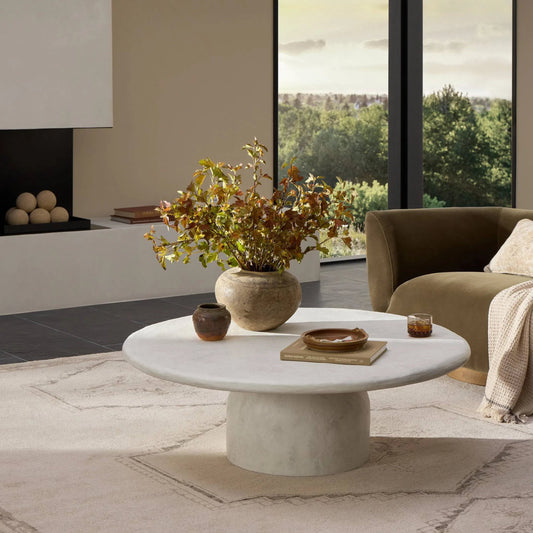 Janice Coffee Table by Four Hands in textured lunar concrete. Made from solid concrete in a modern style.