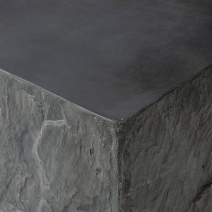Lucius End Table by Four Hands in smooth black concrete, textured black concrete and smooth black concrete. Made from concrete in a modern style.