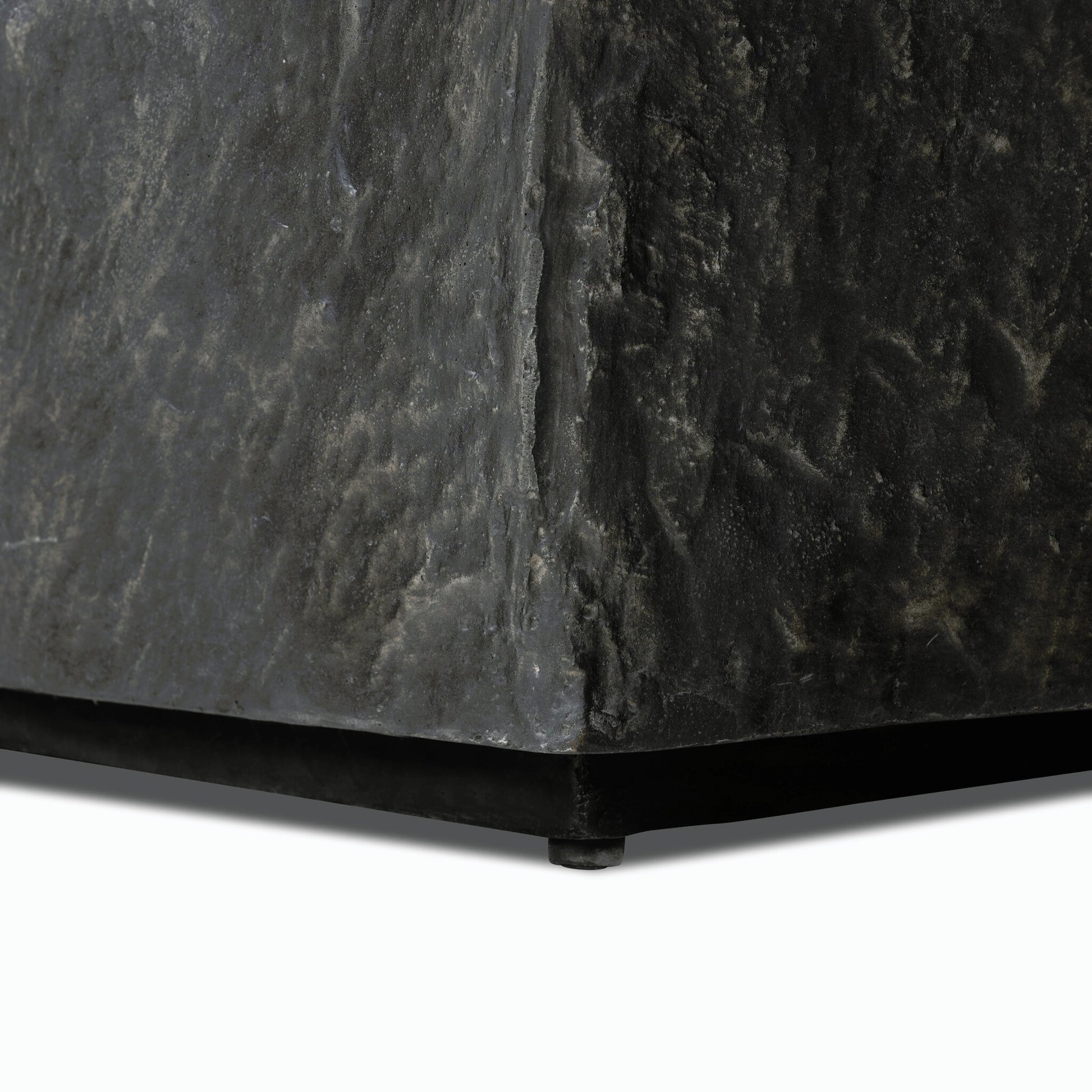 Lucius End Table by Four Hands in smooth black concrete, textured black concrete and smooth black concrete. Made from concrete in a modern style.