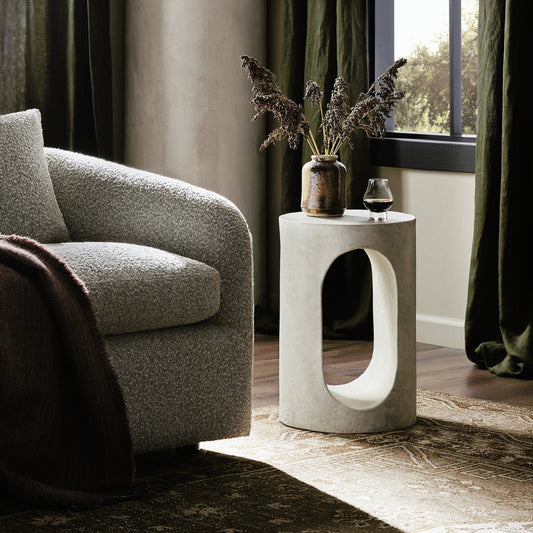 Samson End Table by Four Hands in textured lunar concrete. Made from concrete in a modern style.