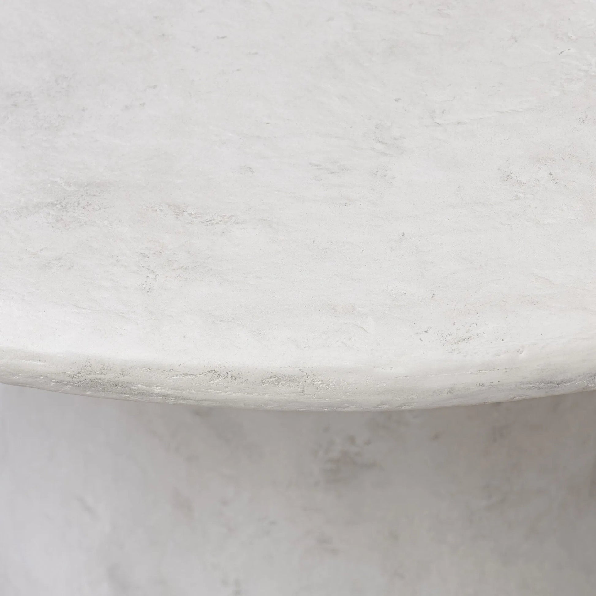 Janice Dining Table by Four Hands in textured lunar concrete. Made from solid concrete in a transitional style.