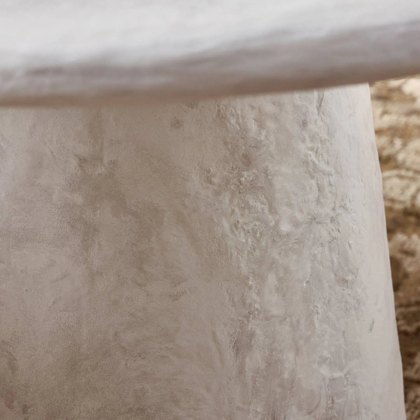 010 SI-2519204 | Closeup | Janice Dining Table by Four Hands in textured lunar concrete. Made from solid concrete in a transitional style.