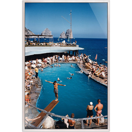 Marina Piccola by Slim Aarons by Four Hands. Made from white washed maple floater, gloss white chromaluxe in a coastal style.