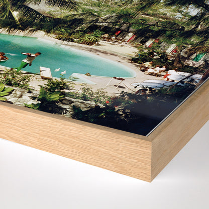 Eleuthra Pool Party by Slim Aarons by Four Hands. Made from vertical grain floater white oak, gloss white chromaluxe in a coastal style.