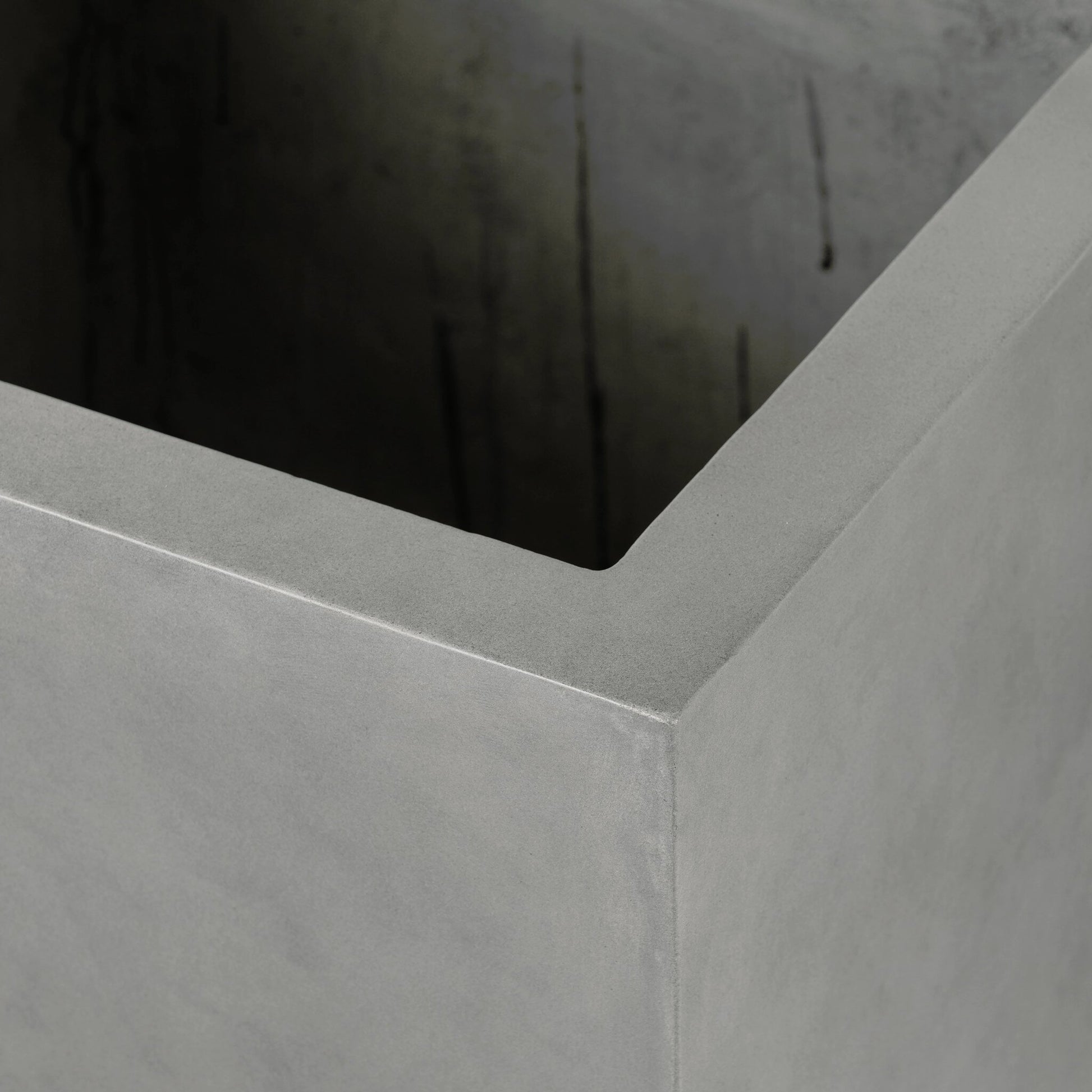 Kiro Planter by Four Hands in natural grey concrete. Made from concrete in a modern style.