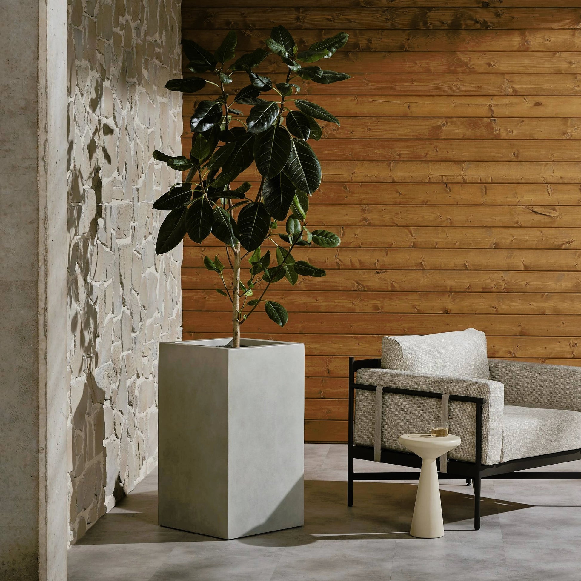 Kiro Planter by Four Hands in natural grey concrete. Made from concrete in a modern style.