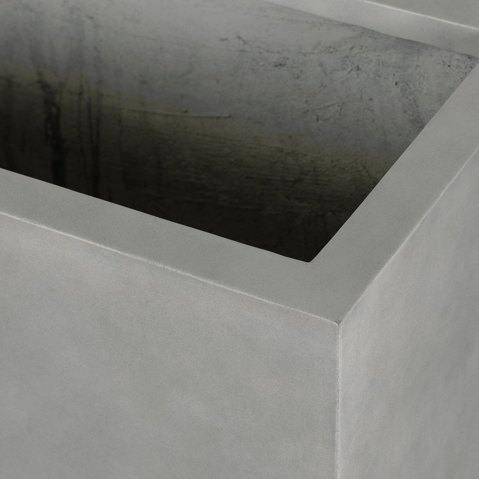 Kiro Planter by Four Hands in natural grey concrete. Made from concrete in a modern style.