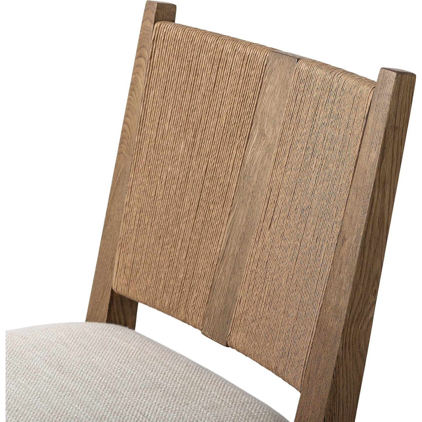 004 SI-2519306 | Closeup | Selene Dining Chair by Four Hands in dover crescent, aged oak, natural paper cord. Made from 71% viscose (rayon), 17% polyester, 12% flax/linen, solid oak, rush in a transitional style.