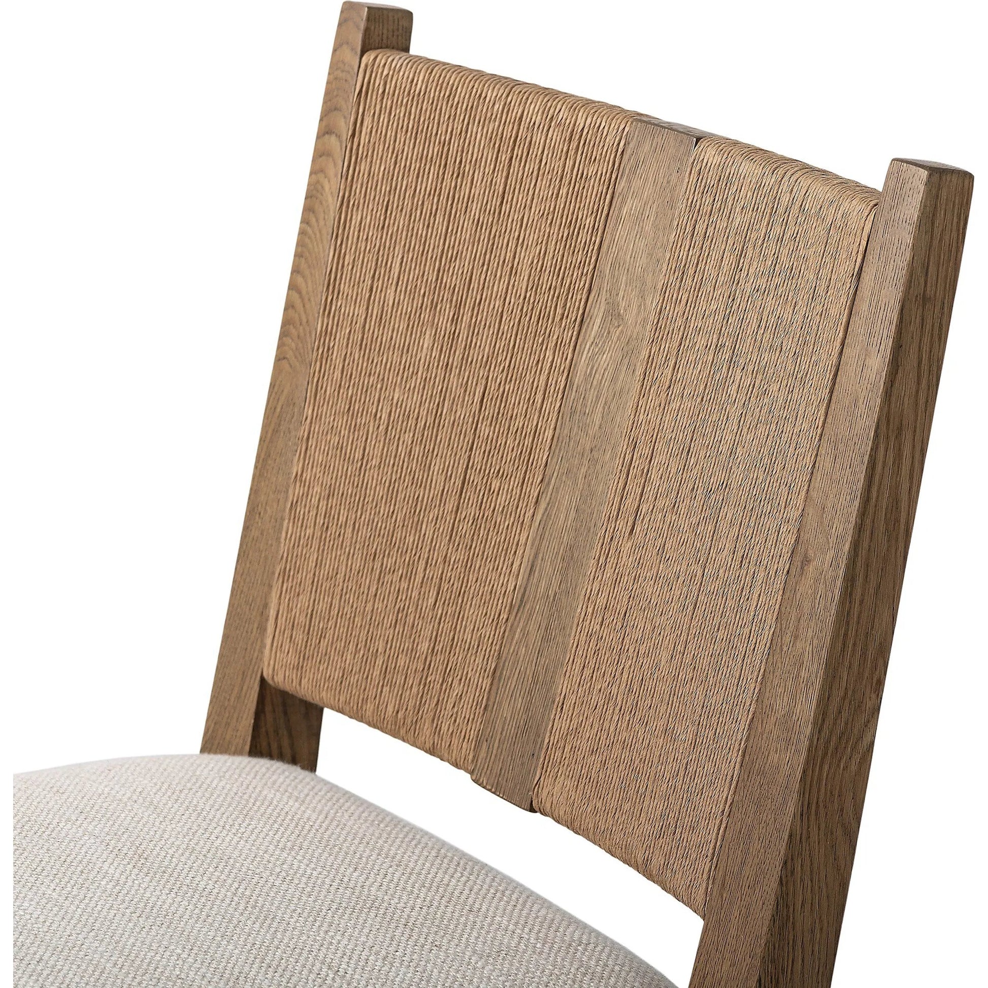 Selene Dining Chair by Four Hands in dover crescent, aged oak, natural paper cord. Made from 71% viscose (rayon), 17% polyester, 12% flax/linen, solid oak, rush in a transitional style.