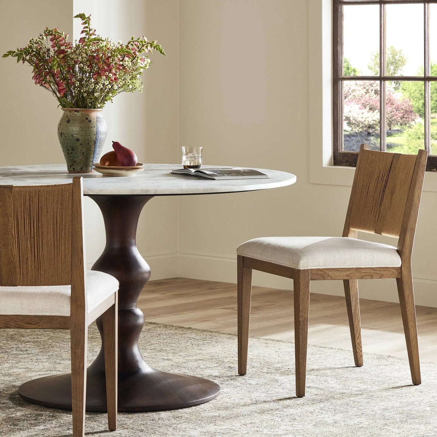 010 SI-2519306 | Lifestyle | Selene Dining Chair by Four Hands in dover crescent, aged oak, natural paper cord. Made from 71% viscose (rayon), 17% polyester, 12% flax/linen, solid oak, rush in a transitional style.