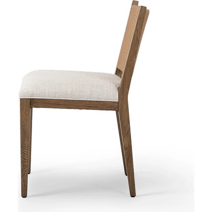 Selene Dining Chair by Four Hands in dover crescent, aged oak, natural paper cord. Made from 71% viscose (rayon), 17% polyester, 12% flax/linen, solid oak, rush in a transitional style.