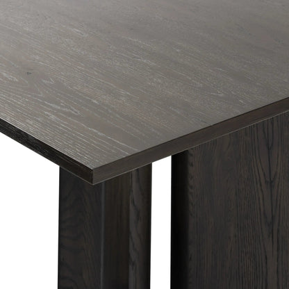 Huxley Dining Table by Four Hands in smoked black veneer. Made from thick oak veneer, solid oak in a unique style.