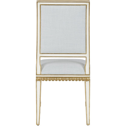 Ines Chair by Currey and Company in mixology moonstone and ivory, antique gold. Made from mahogany in a transitional style.
