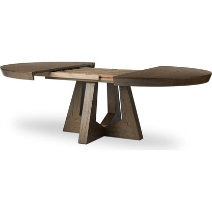 Zelda Round Extension Dining Table by Four Hands in fawn oak veneer. Made from oak veneer, solid oak in a transitional style.