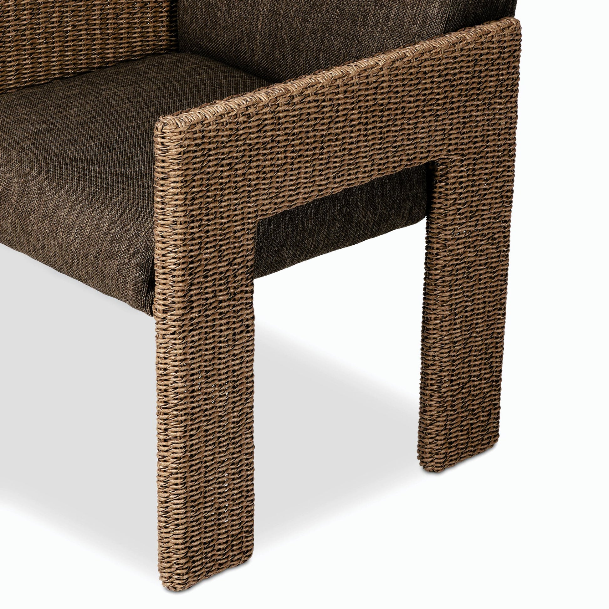 Amur Outdoor Dining Chair by Four Hands. Made from 100% olefin, 100% polyethylene, 74% polyurethane foam pad, 26% polyester fiber batting in a modern style.