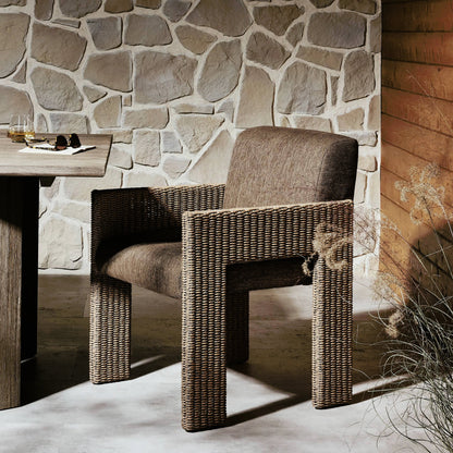 Amur Outdoor Dining Chair by Four Hands. Made from 100% olefin, 100% polyethylene, 74% polyurethane foam pad, 26% polyester fiber batting in a modern style.