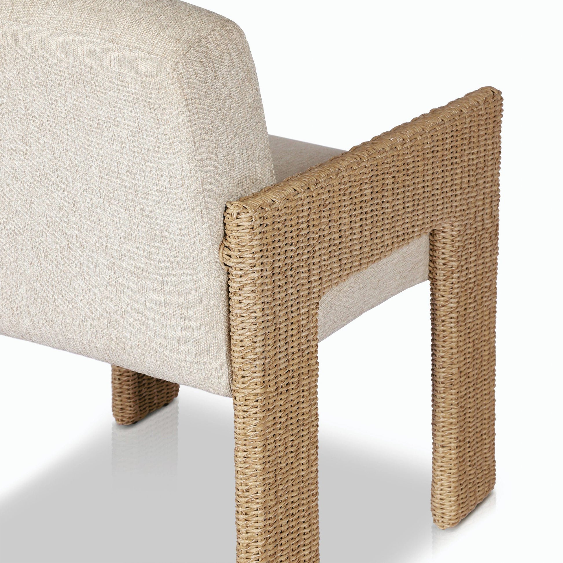 Amur Outdoor Dining Chair by Four Hands. Made from 100% olefin, 100% polyethylene, 74% polyurethane foam pad, 26% polyester fiber batting in a modern style.