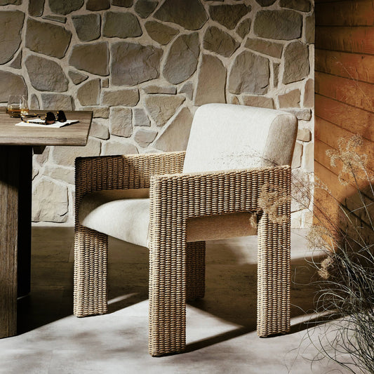 Amur Outdoor Dining Chair by Four Hands. Made from 100% olefin, 100% polyethylene, 74% polyurethane foam pad, 26% polyester fiber batting in a modern style.