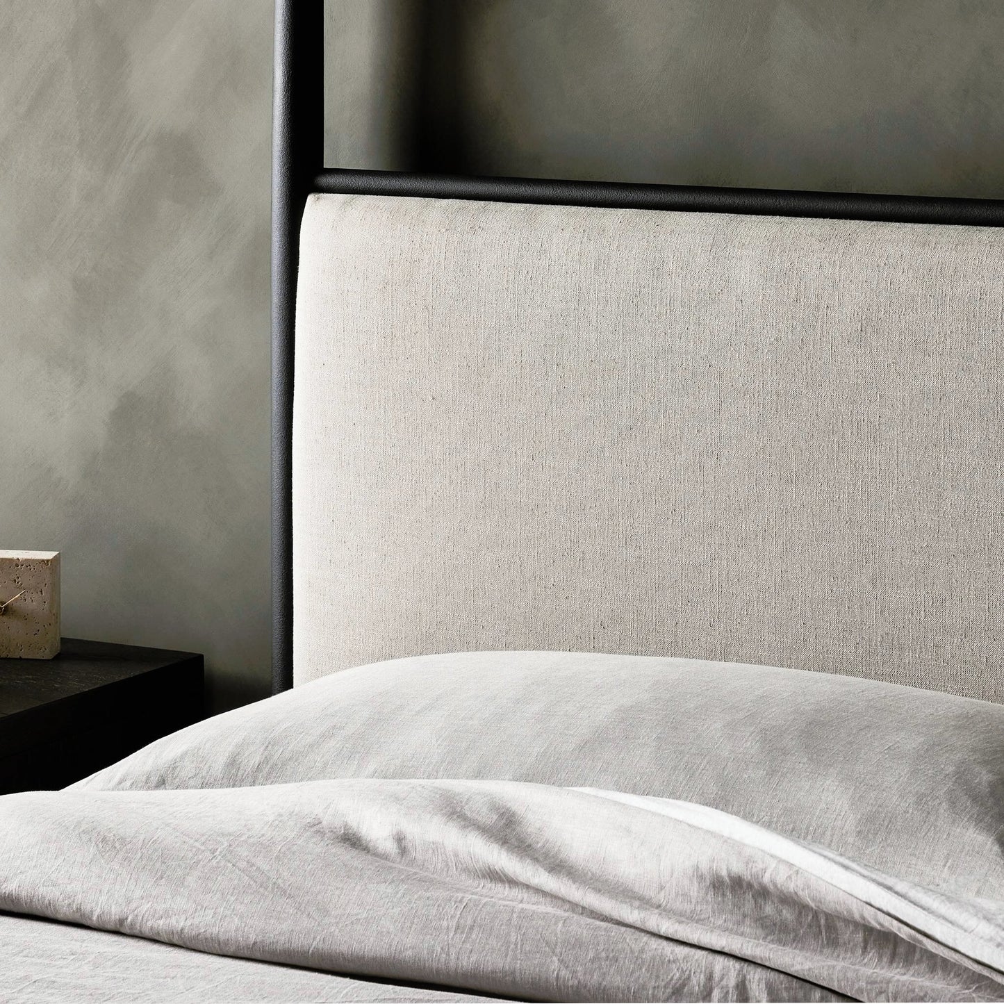 016 SI-2158601 | Closeup | Xander Canopy Bed by Four Hands in savoy parchment, textured black iron. Made from 54% polyester, 36% viscose (rayon), 10% flax/linen, iron in a modern style.