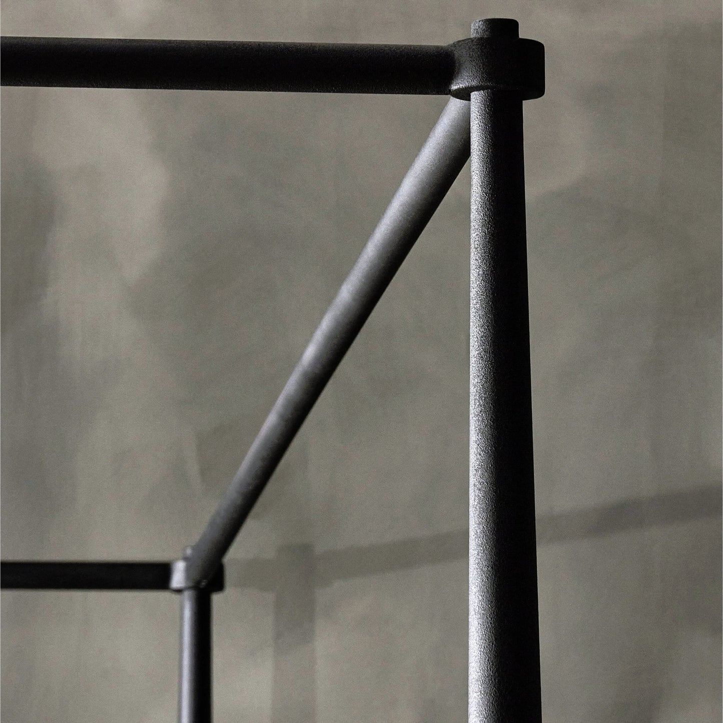 021 SI-2158601 | Closeup | Xander Canopy Bed by Four Hands in savoy parchment, textured black iron. Made from 54% polyester, 36% viscose (rayon), 10% flax/linen, iron in a modern style.