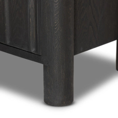 Ezri Sideboard by Four Hands in cocoa oak, carved cocoa oak. Made from solid oak in a modern style.