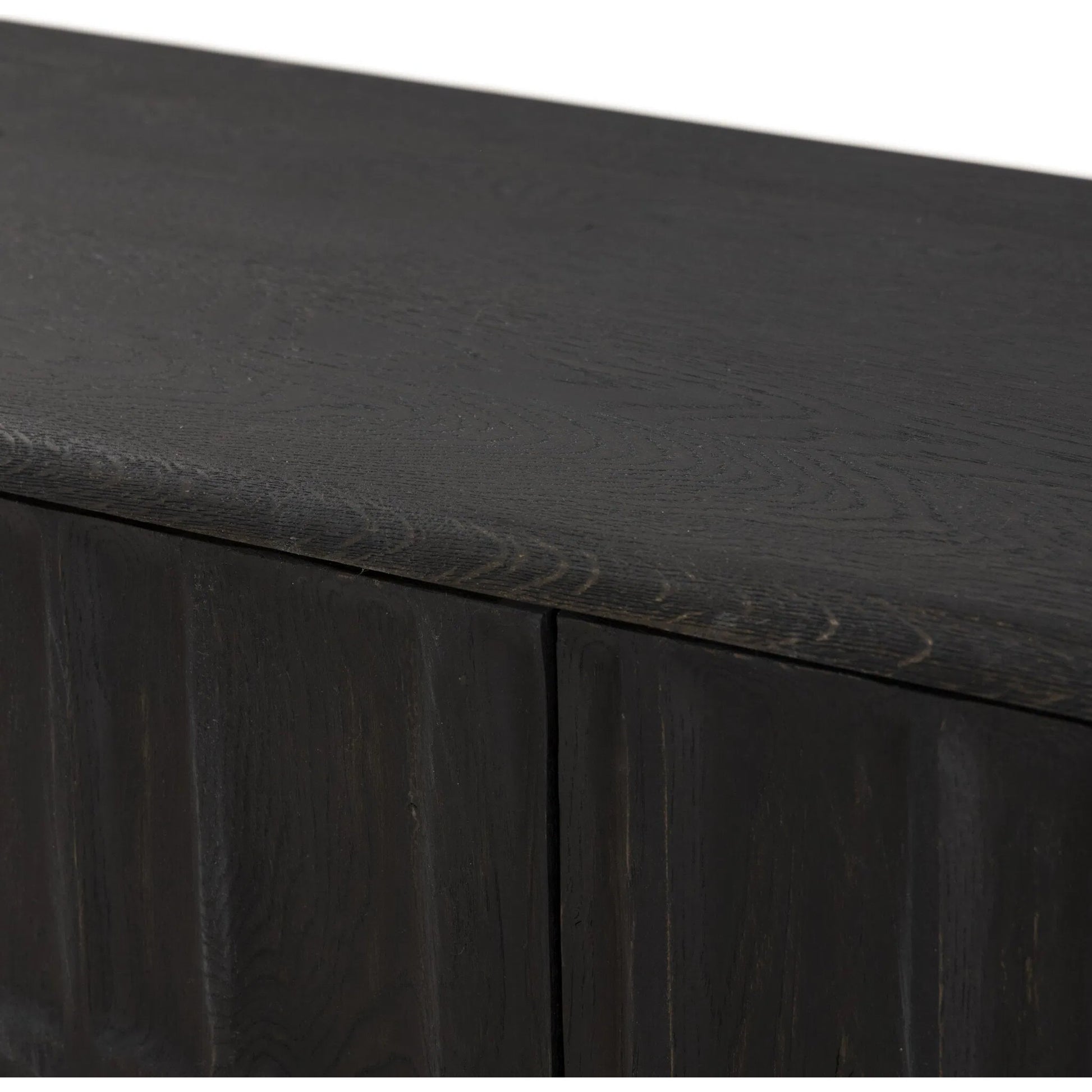 Ezri Sideboard by Four Hands in cocoa oak, carved cocoa oak. Made from solid oak in a modern style.