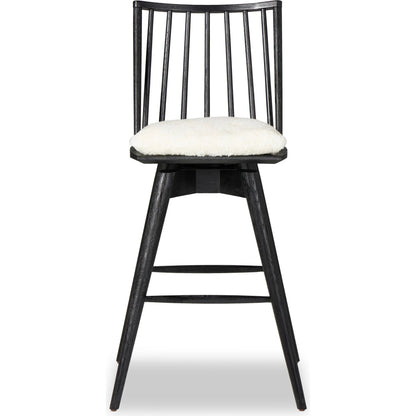 Lewis Swivel Bar Stool by Four Hands. Made from unique in a modern style.
