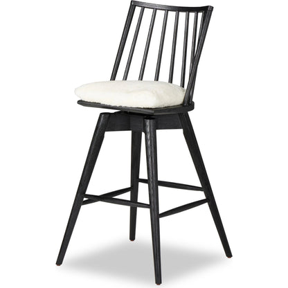 Lewis Swivel Bar Stool by Four Hands. Made from unique in a modern style.