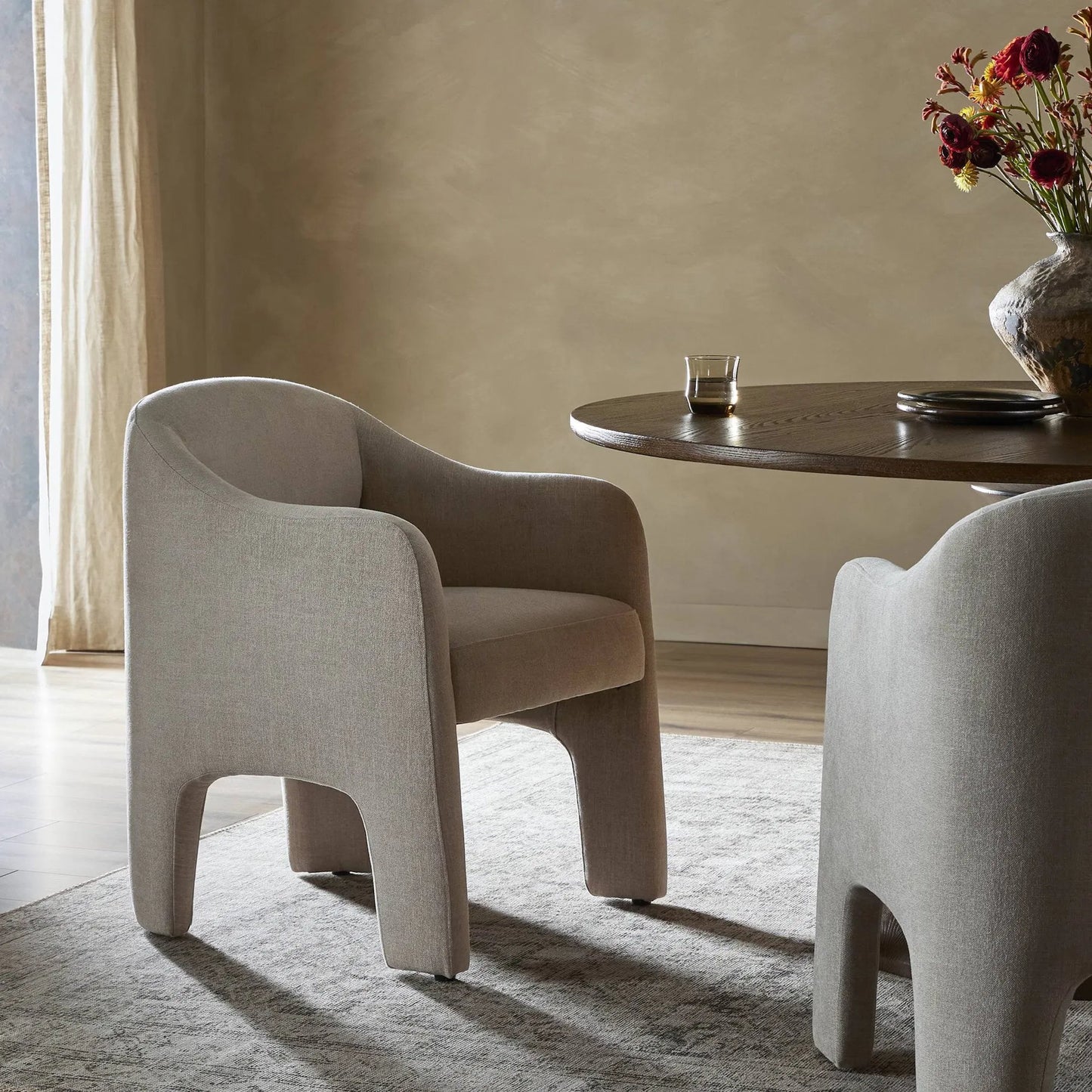 009 SI-2320271 | Lifestyle | Sully Dining Chair by Four Hands in harbor sand. Made from 60% polyester, 40% viscose (rayon) in a unique style.