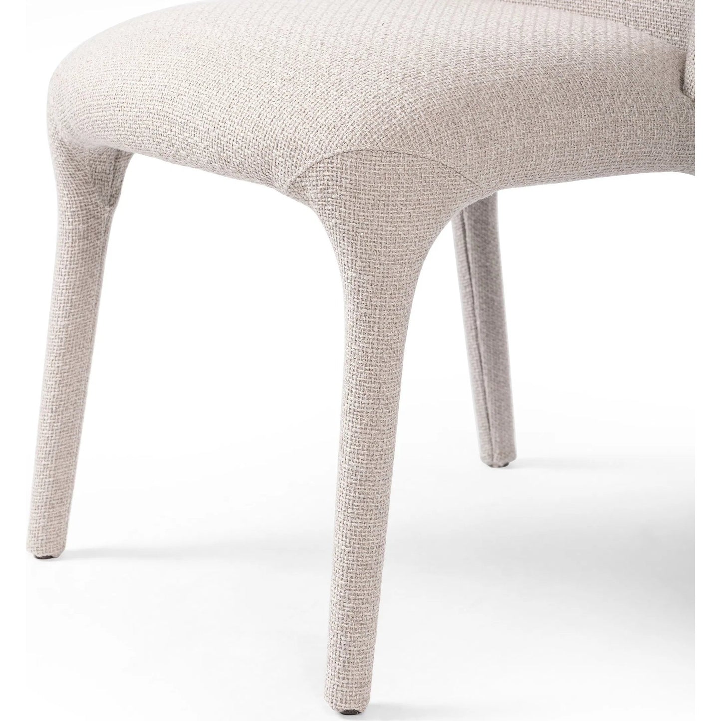 006 SI-2319992 | Closeup | Bensen Dining Chair by Four Hands in gibson taupe. Made from 97% polyester, 3% acrylic in a coastal style.