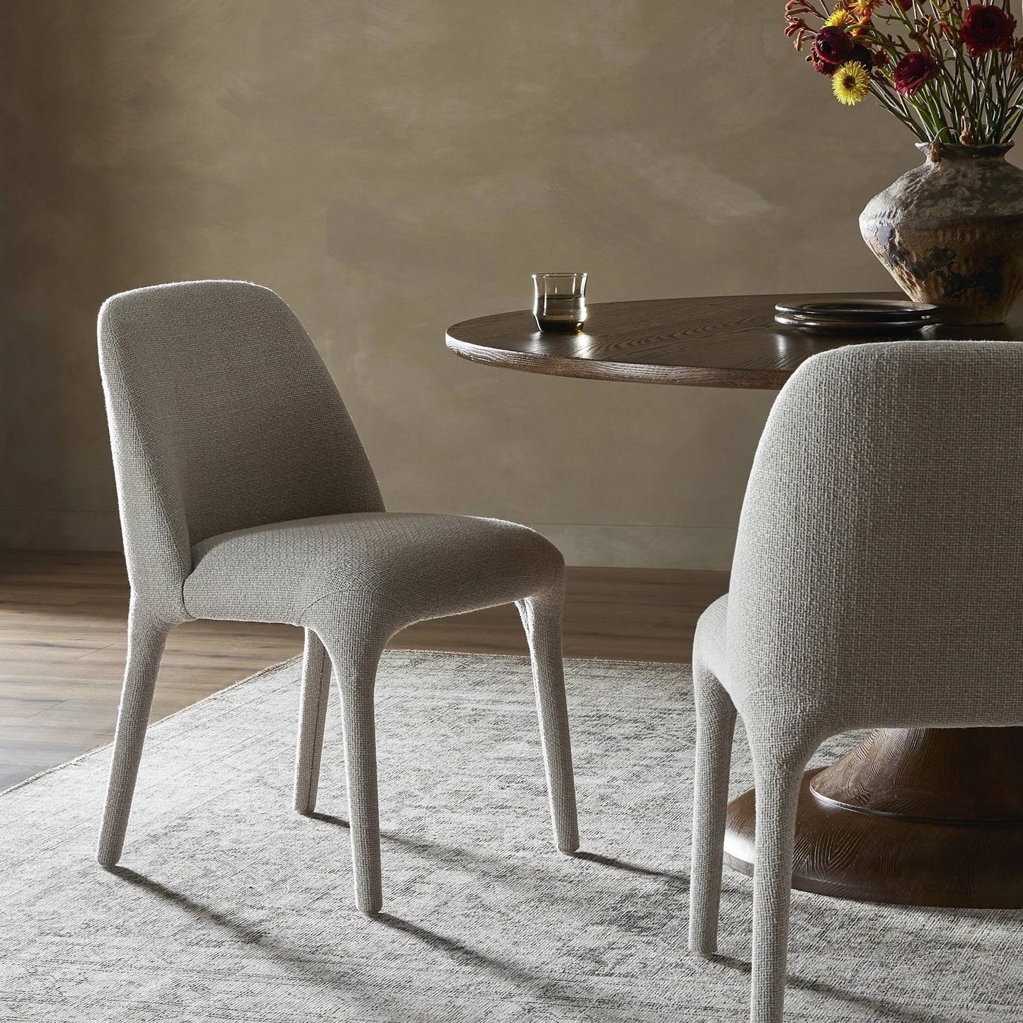 008 SI-2319992 | Lifestyle | Bensen Dining Chair by Four Hands in gibson taupe. Made from 97% polyester, 3% acrylic in a coastal style.