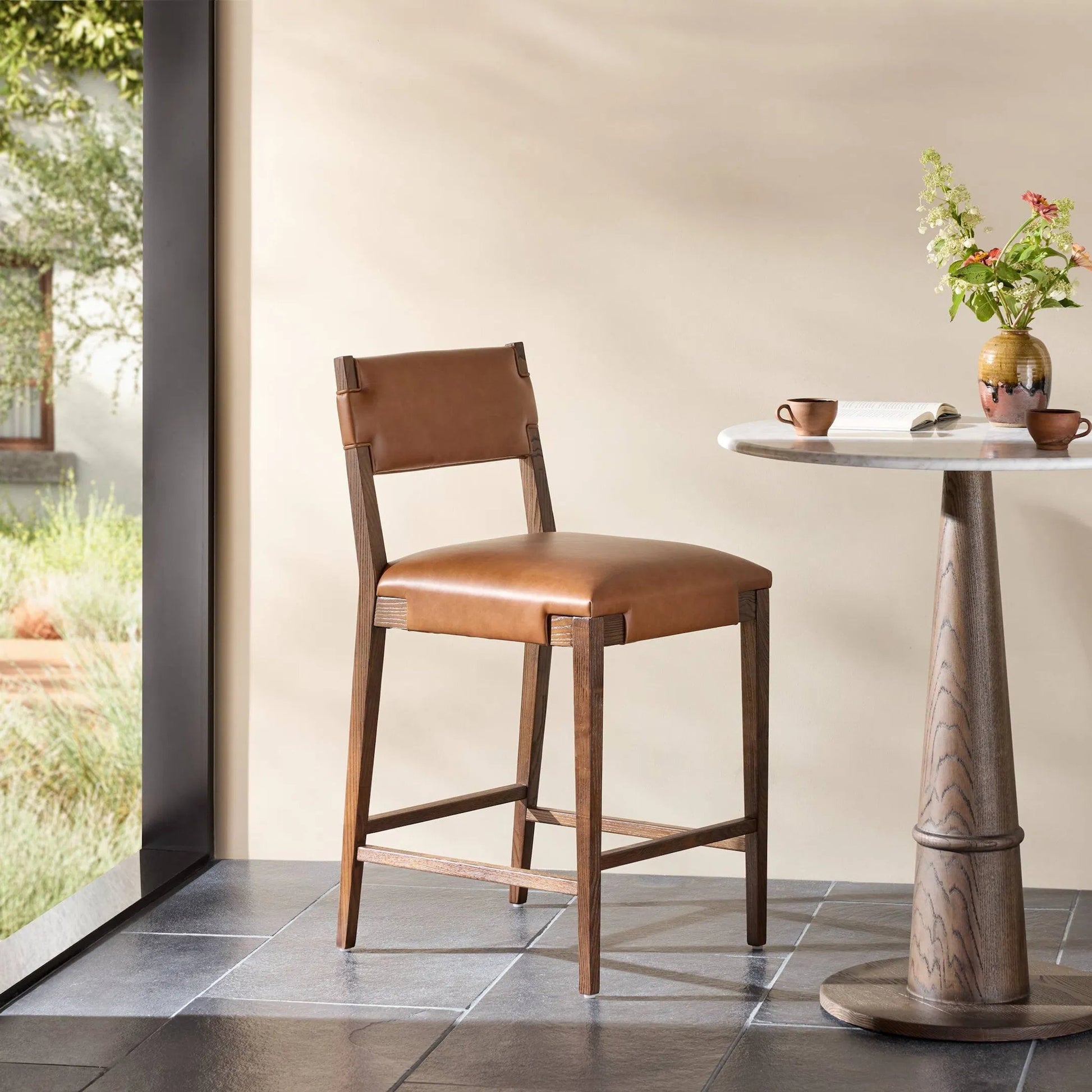 Tamari Counter Stool by Four Hands. Made from unique in a transitional style.