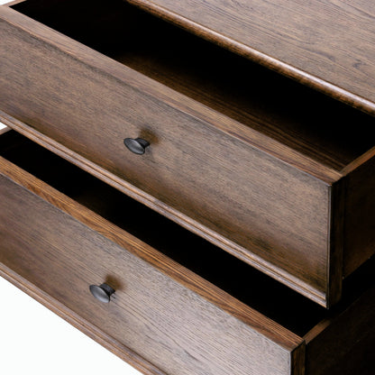 Russ Nightstand by Four Hands in aged oak, aged oak veneer and aged oak. Made from solid oak, oak veneer in a modern style.