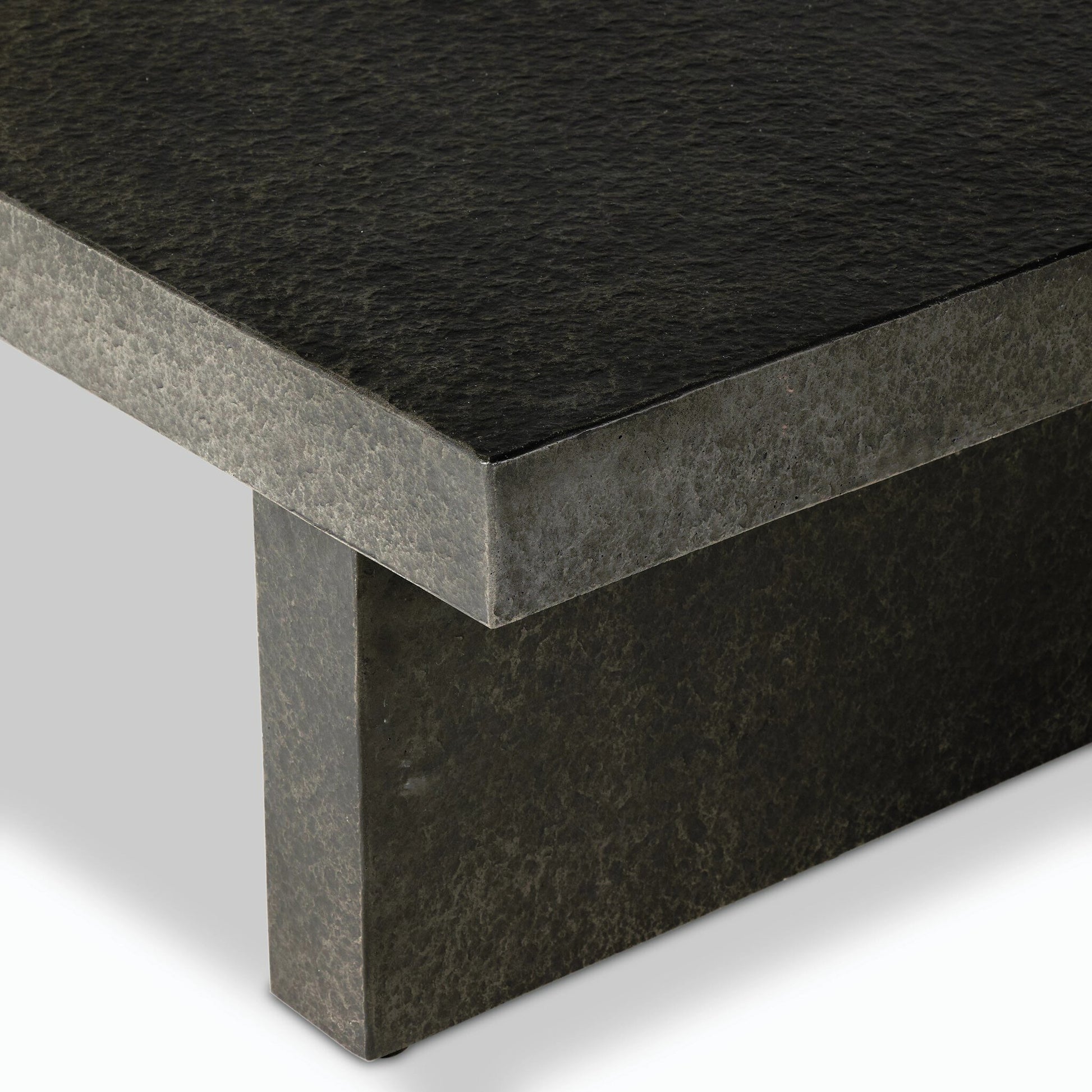 Huesca Outdoor Coffee Table by Four Hands in distressed graphite concrete. Made from concrete in a modern style.