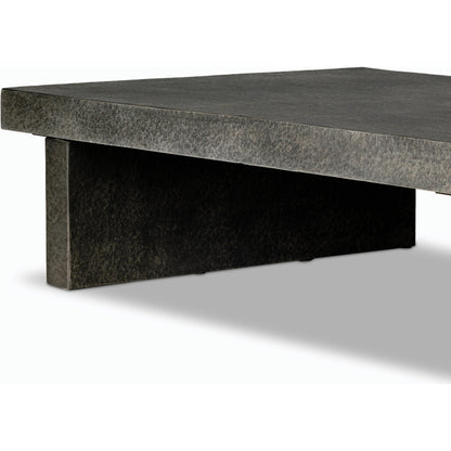 Huesca Outdoor Coffee Table by Four Hands in distressed graphite concrete. Made from concrete in a modern style.