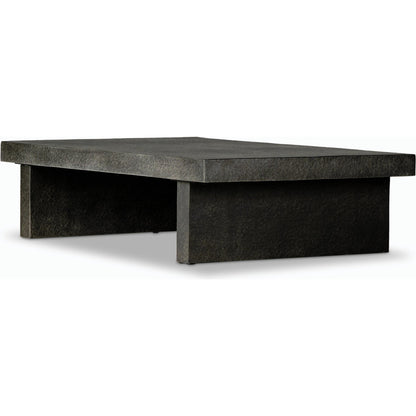 Huesca Outdoor Coffee Table by Four Hands in distressed graphite concrete. Made from concrete in a modern style.