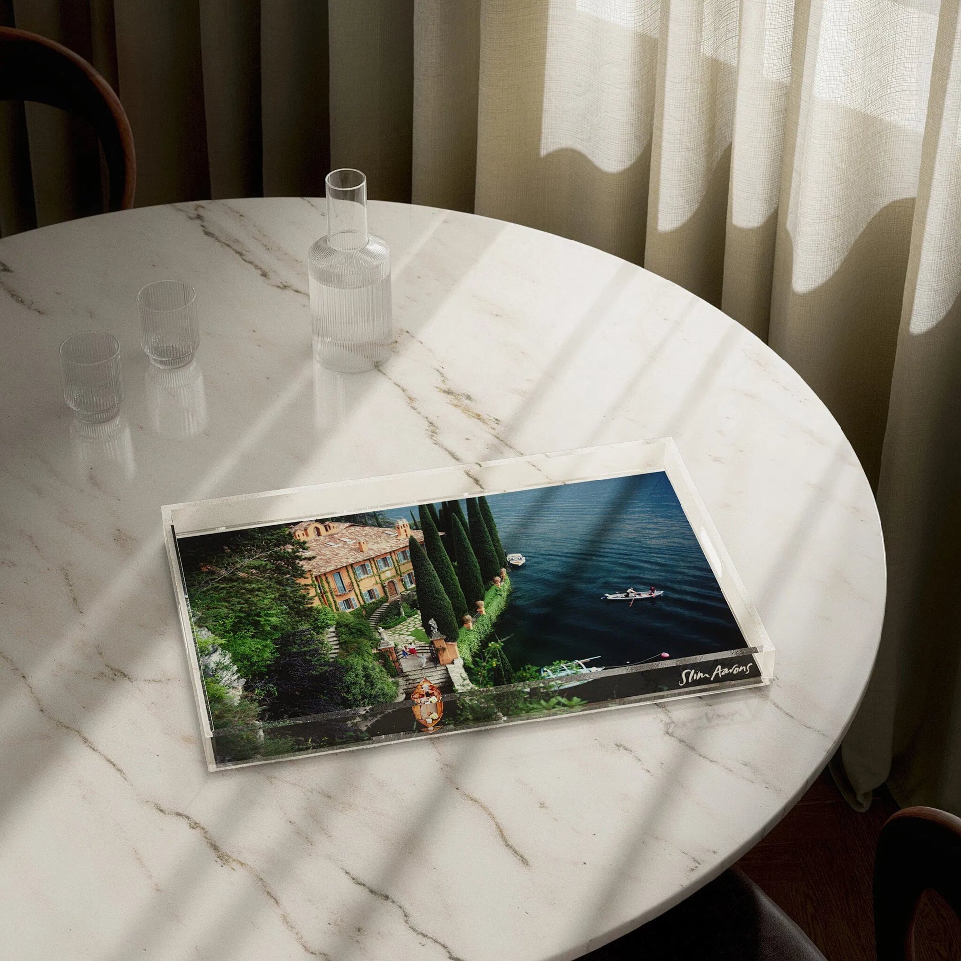 Giacomo Montegazza Tray by Slim Aarons by Four Hands in 1/4" clear cast acrylic. Made from 1/4" cast acrylic in a modern style.