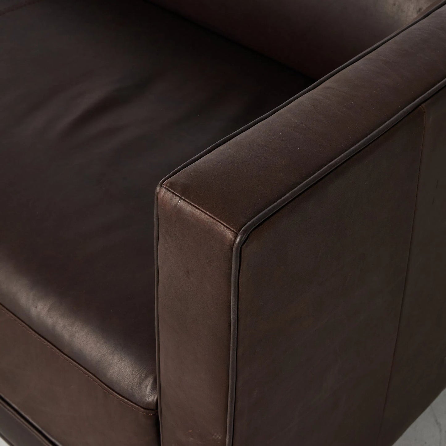 006 SI-2257111 | Closeup | Phillip Sofa by Four Hands in heirloom cigar. Made from top grain leather, pine plywood, solid pine in a traditional style.